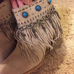 Not rated fringe booties